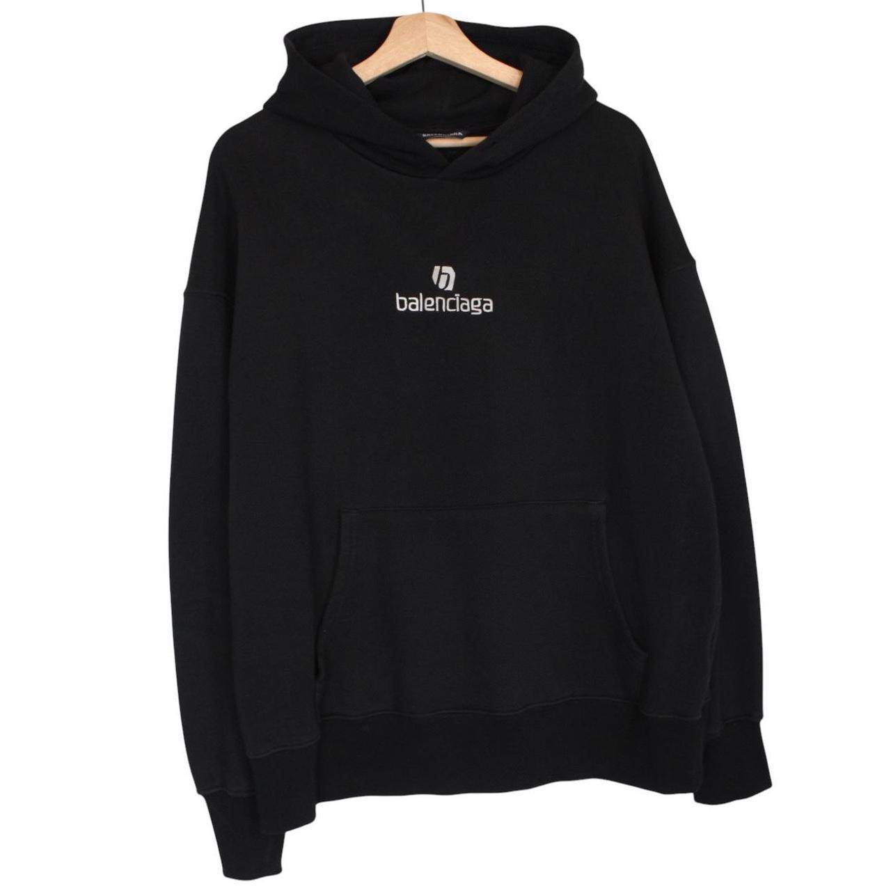 Balenciaga black and white cotton hoodie with sponsor logo and large fit.