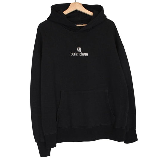 Balenciaga black and white cotton hoodie with sponsor logo and large fit.