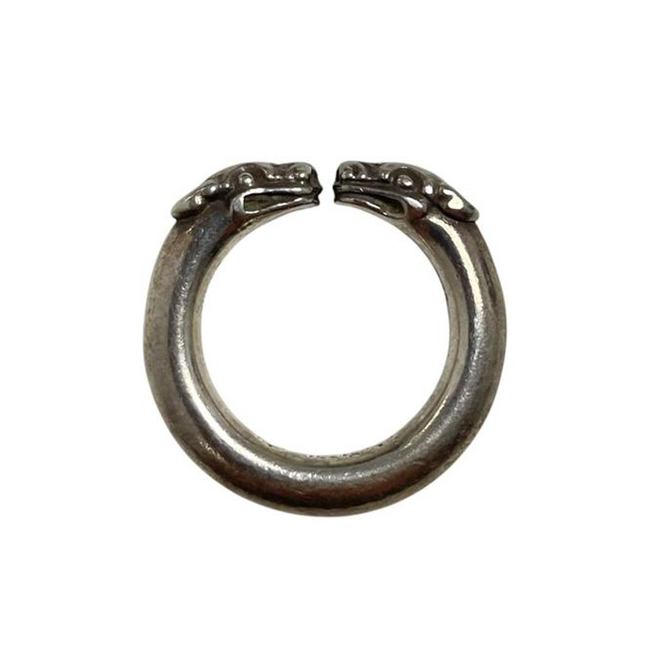 Chrome Hearts silver ring with double dog design and 925 sterling silver material.