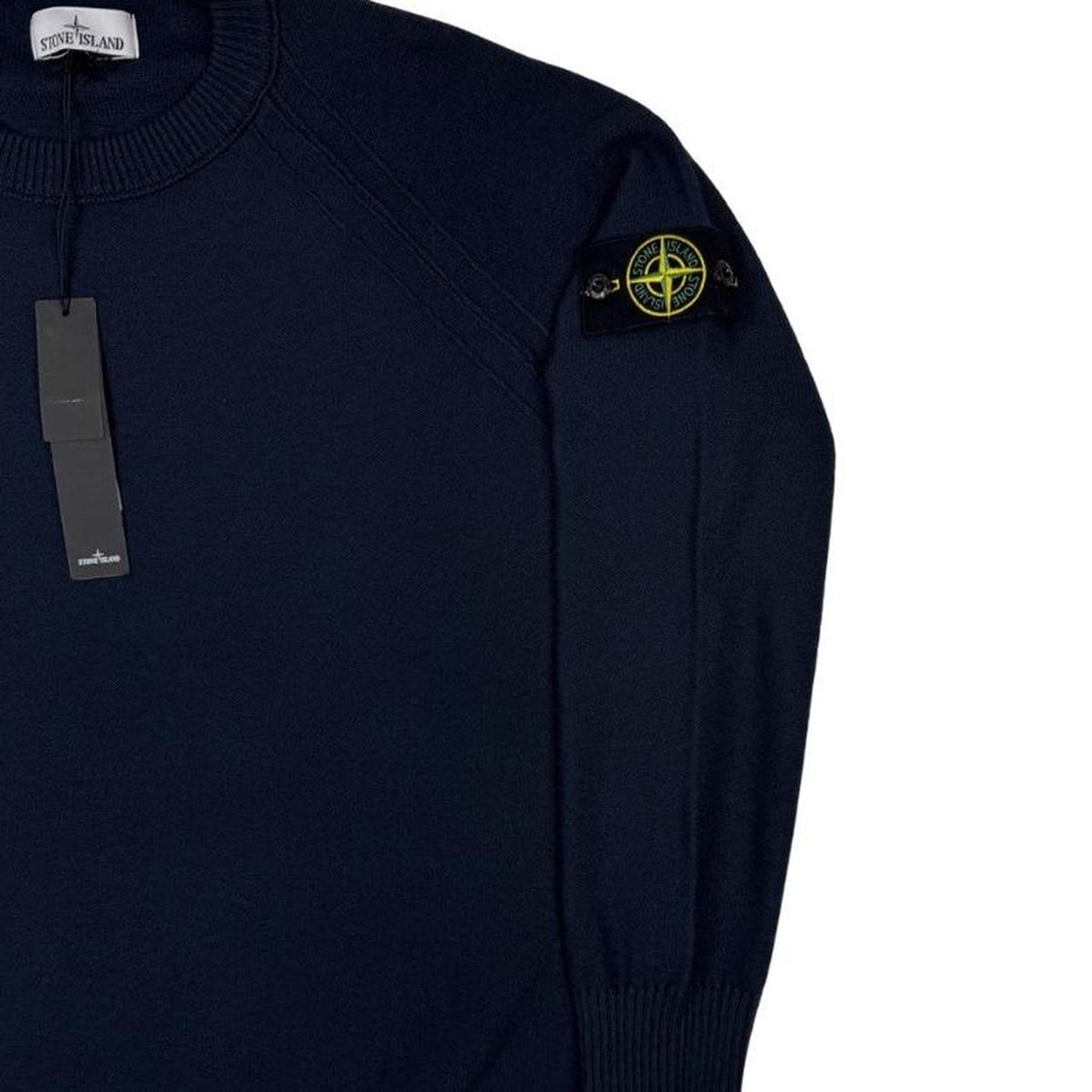 Stone Island navy blue knit jumper with micro stitch detailing and logo patch.