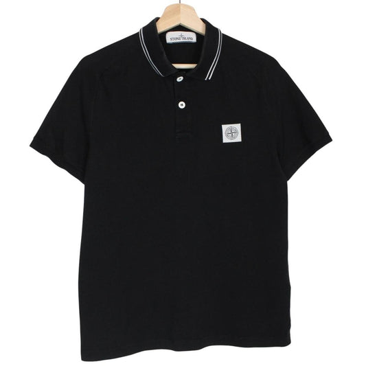Stone Island black polo shirt with embroidered compass logo and cotton material.