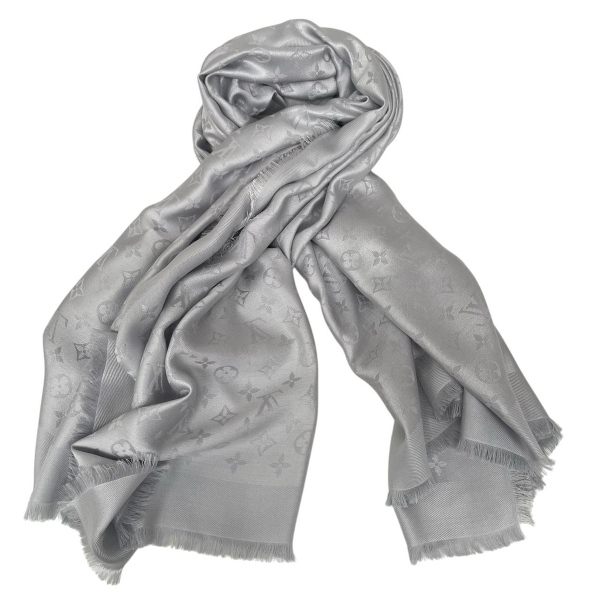 Louis Vuitton grey shawl scarf with LV monogram pattern in silk and wool blend.