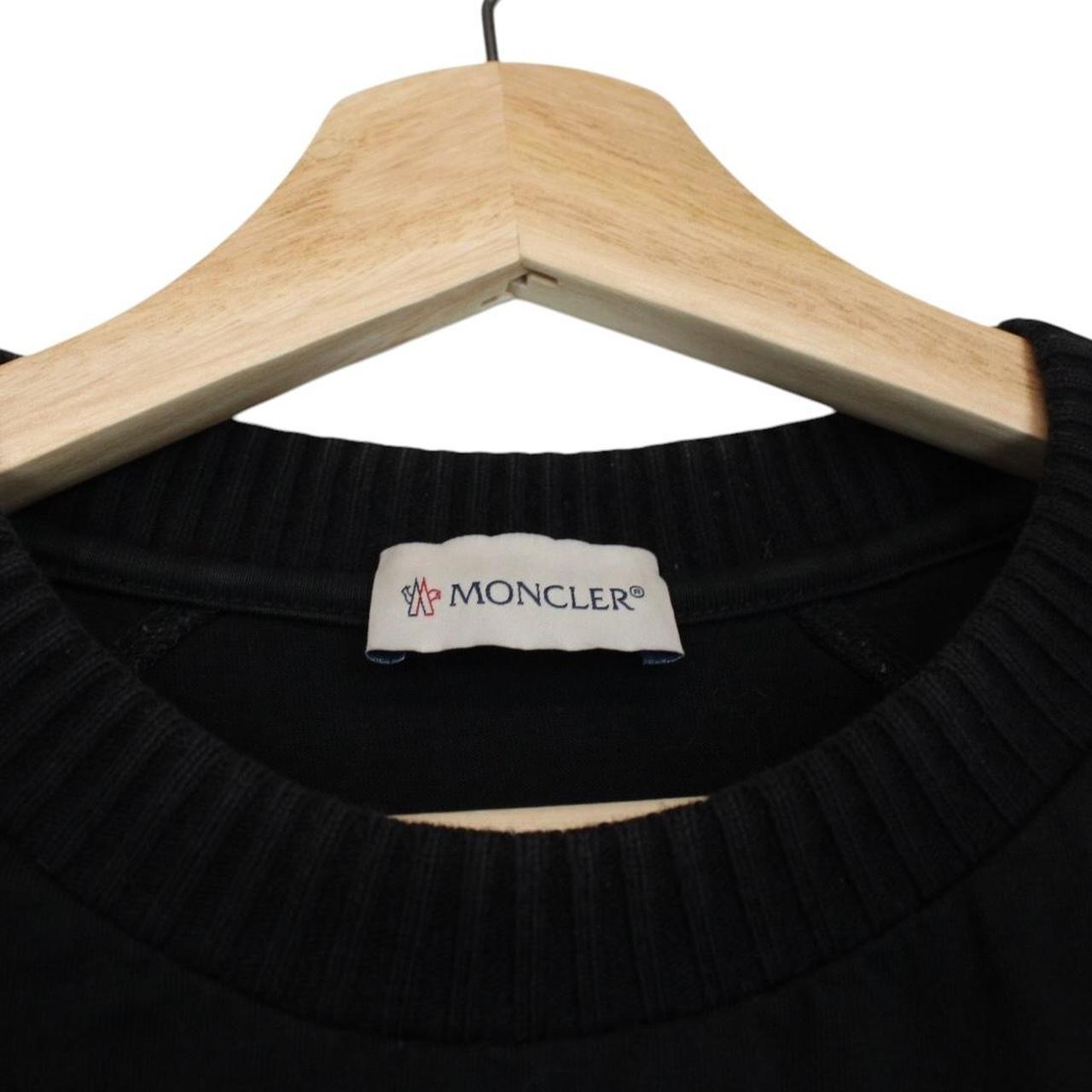 Moncler black and white cotton sweatshirt featuring logo print and good condition.