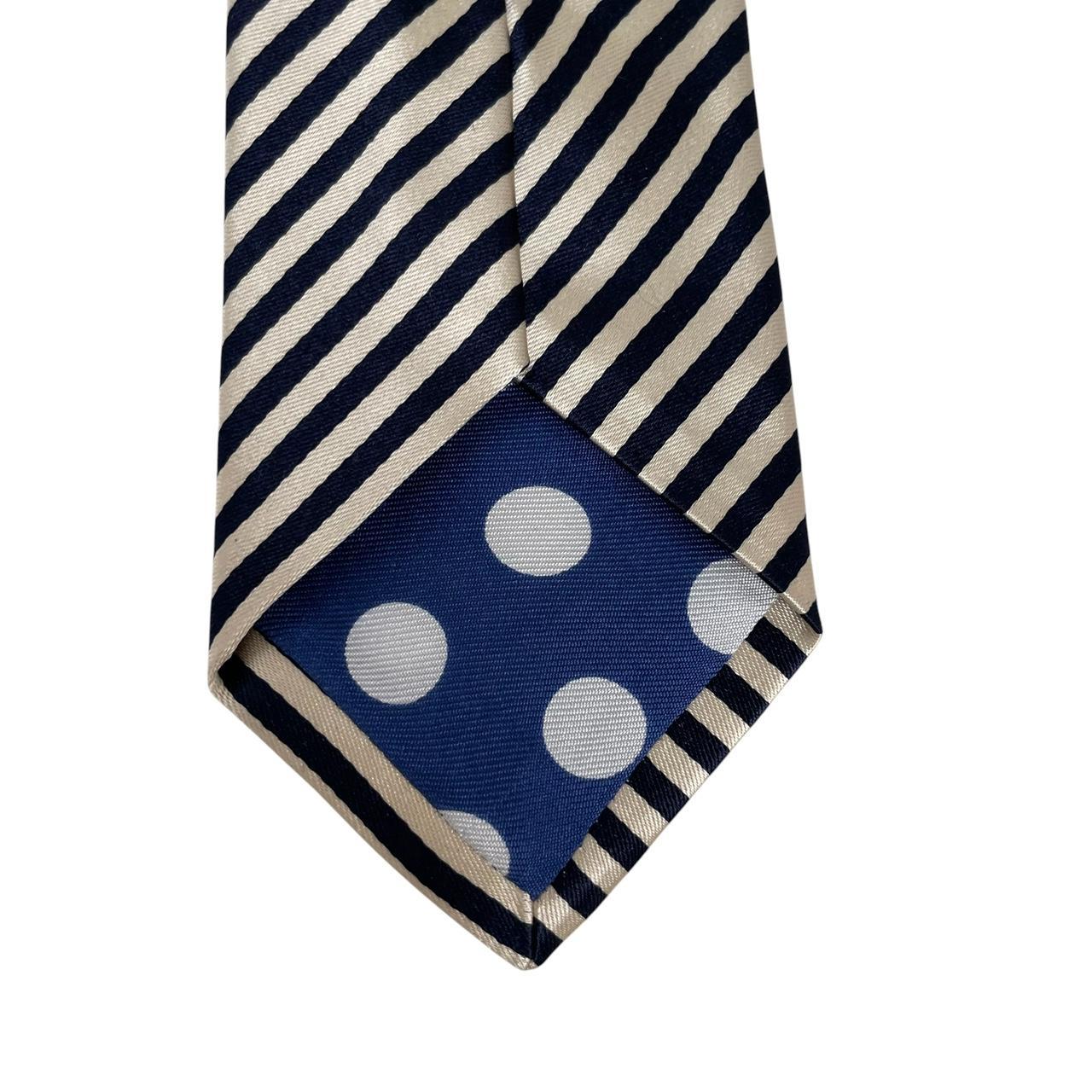 Paul Smith cream and black striped silk tie with logo and brand tags.