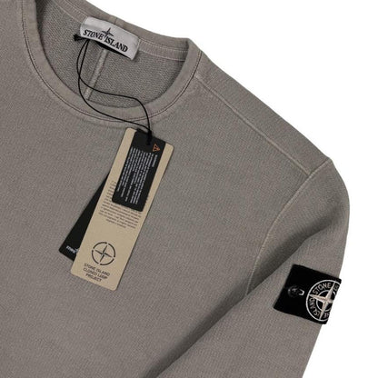 Stone Island khaki brown sweatshirt with logo patch and closed loop design.