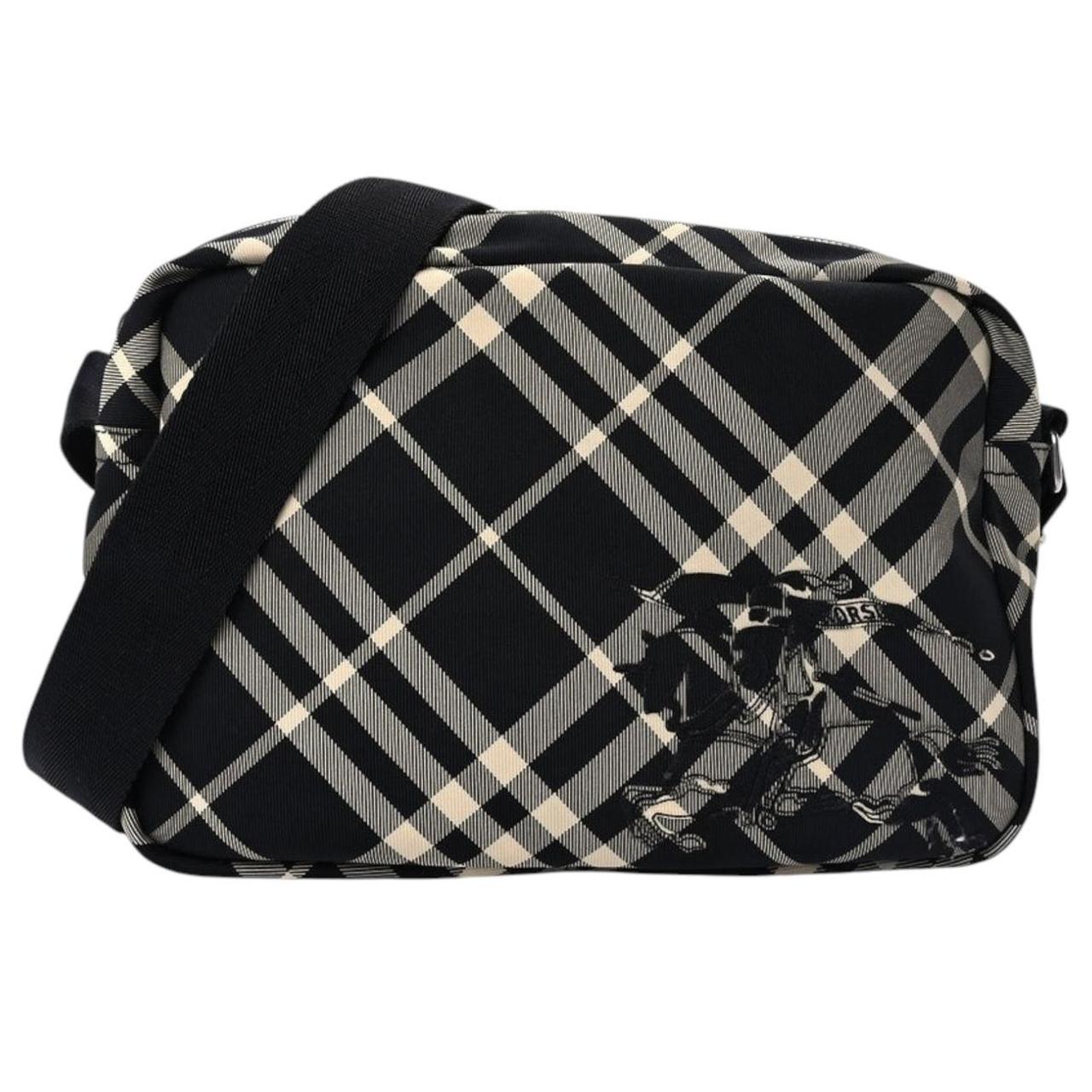 Burberry black and white EKD check canvas duffel bag with logo detail.
