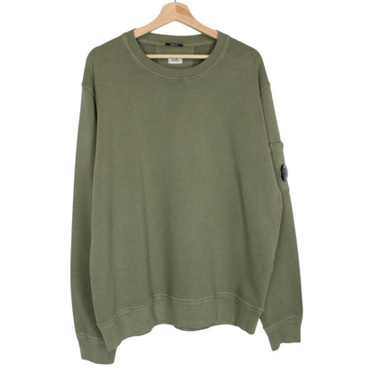 CP Company green sweatshirt diagonal fleece with signature lens detail and logo.