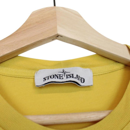 Stone Island yellow short sleeve cotton t-shirt with compass logo and soft fabric.