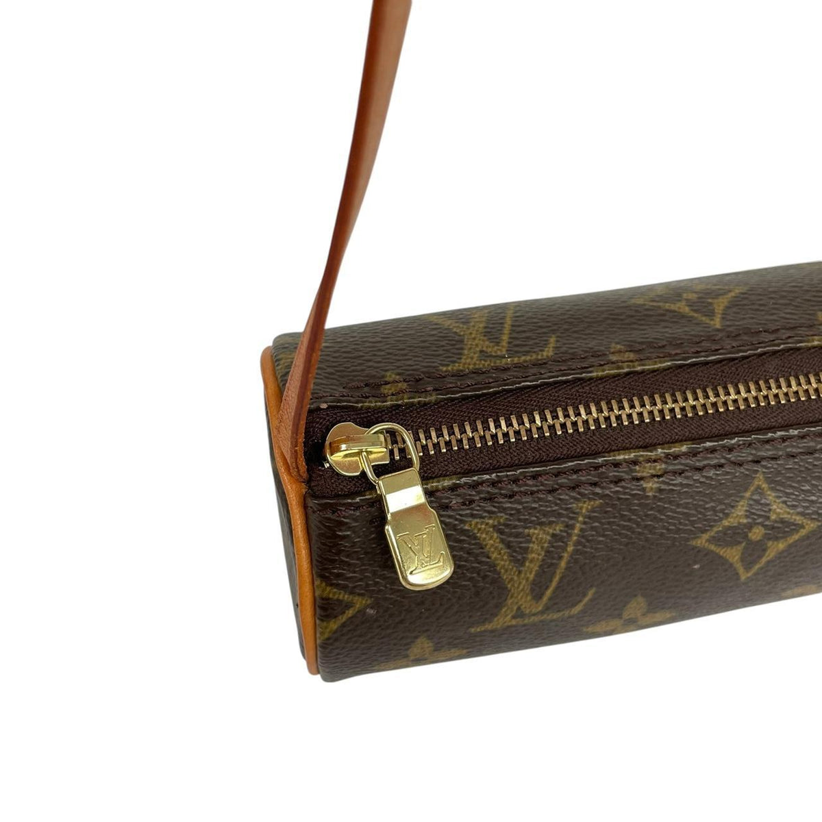 Louis Vuitton brown and tan mini pochette bag with monogram canvas pattern and logo.
