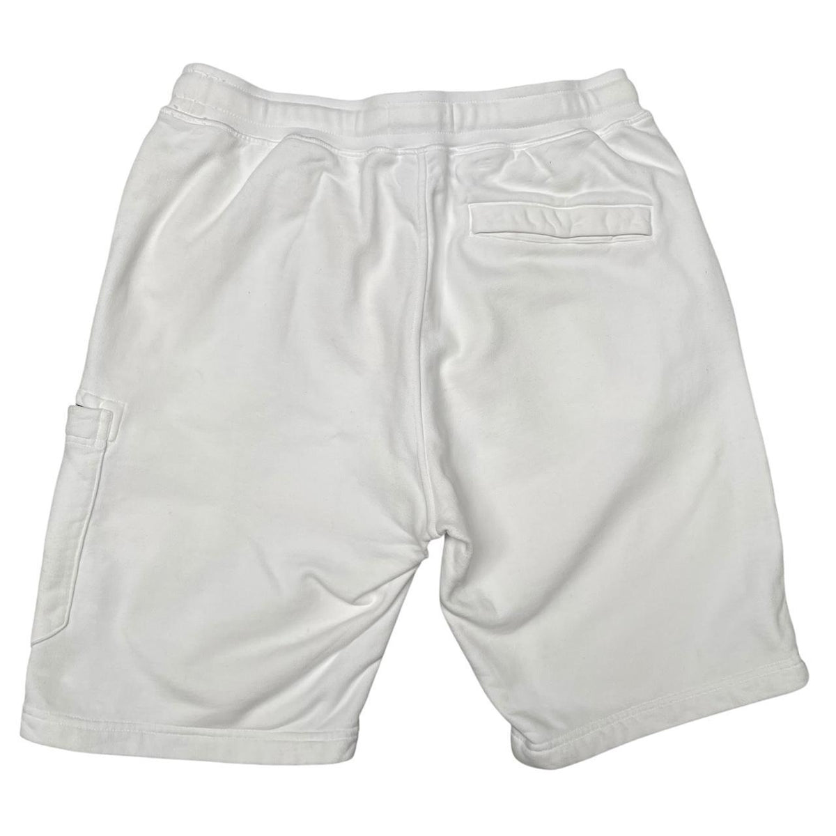 Stone Island white jogger shorts with logo patch and cotton material.