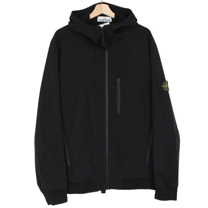 Stone Island black soft shell jacket with full zip and iconic compass logo.
