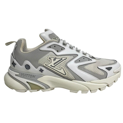 Louis Vuitton white trainers with logo detailing and sleek design, pre-owned condition.