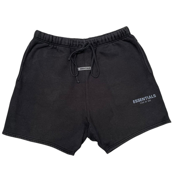 Essentials black jogger shorts cotton material with faded detailing and logo.