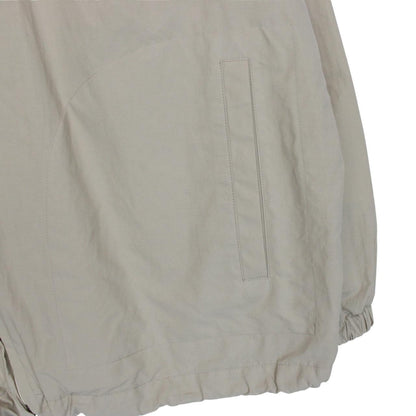 Burberry beige nylon jacket with Nova Check lining and full zip design.