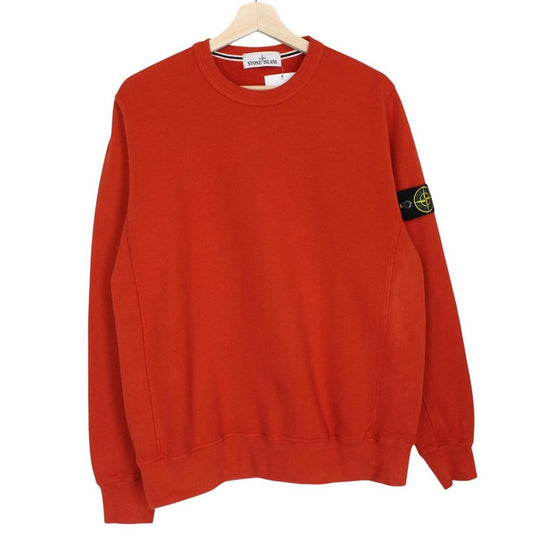 Stone Island red cotton sweatshirt with embroidered logo and ribbed cuffs.