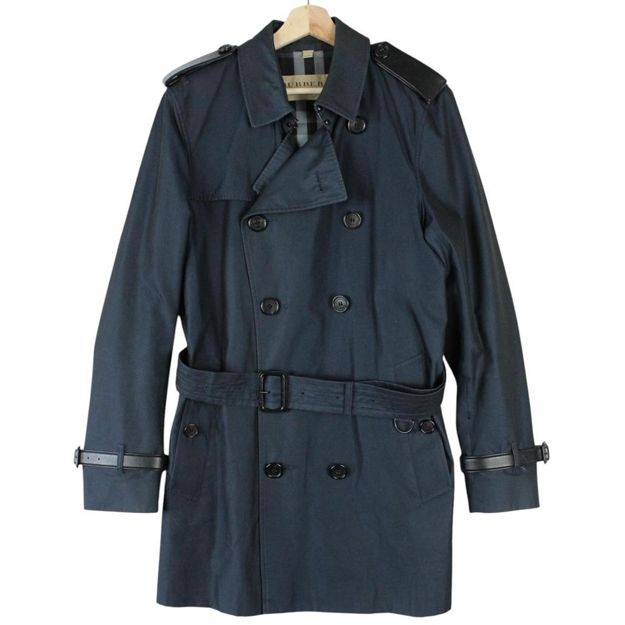 Burberry navy blue trench coat with Nova Check pattern and double-breasted design.