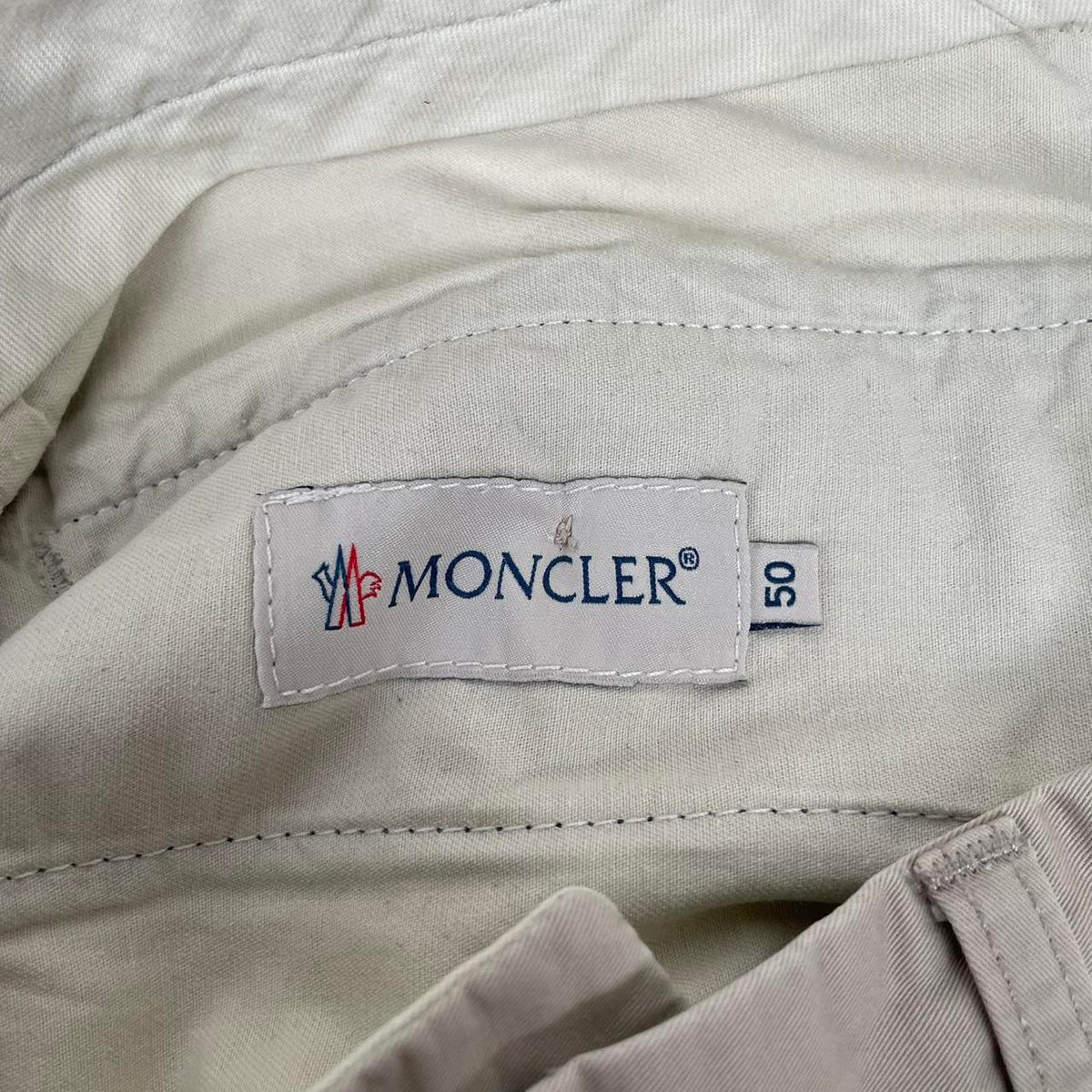 Moncler beige chino shorts with embroidered logo, cotton material, size 50.