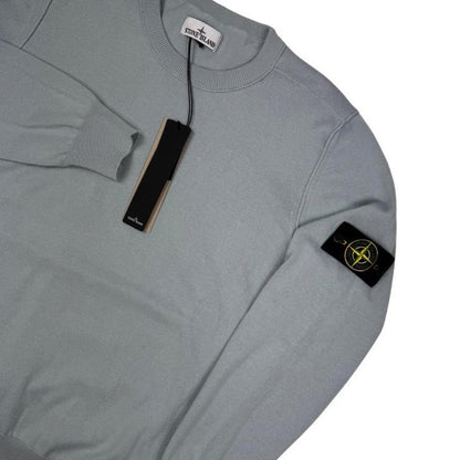 Stone Island grey knit jumper made from organic cotton with logo patch on sleeve.