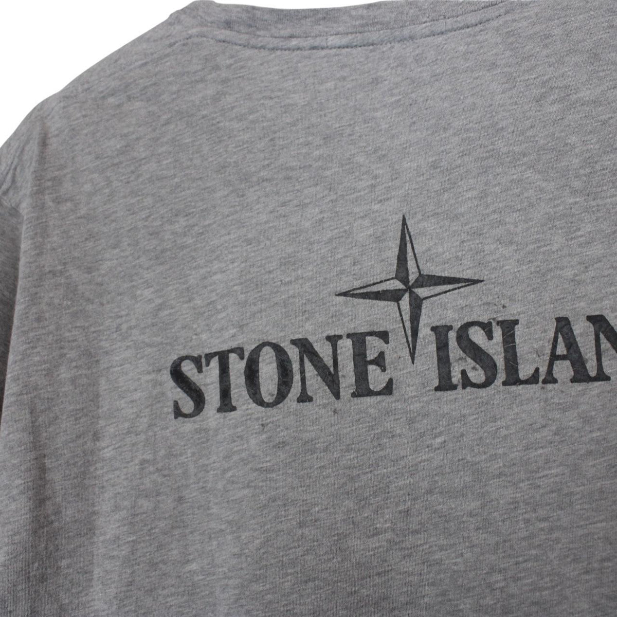 Stone Island grey short sleeve cotton t-shirt with logo print and visible stains.