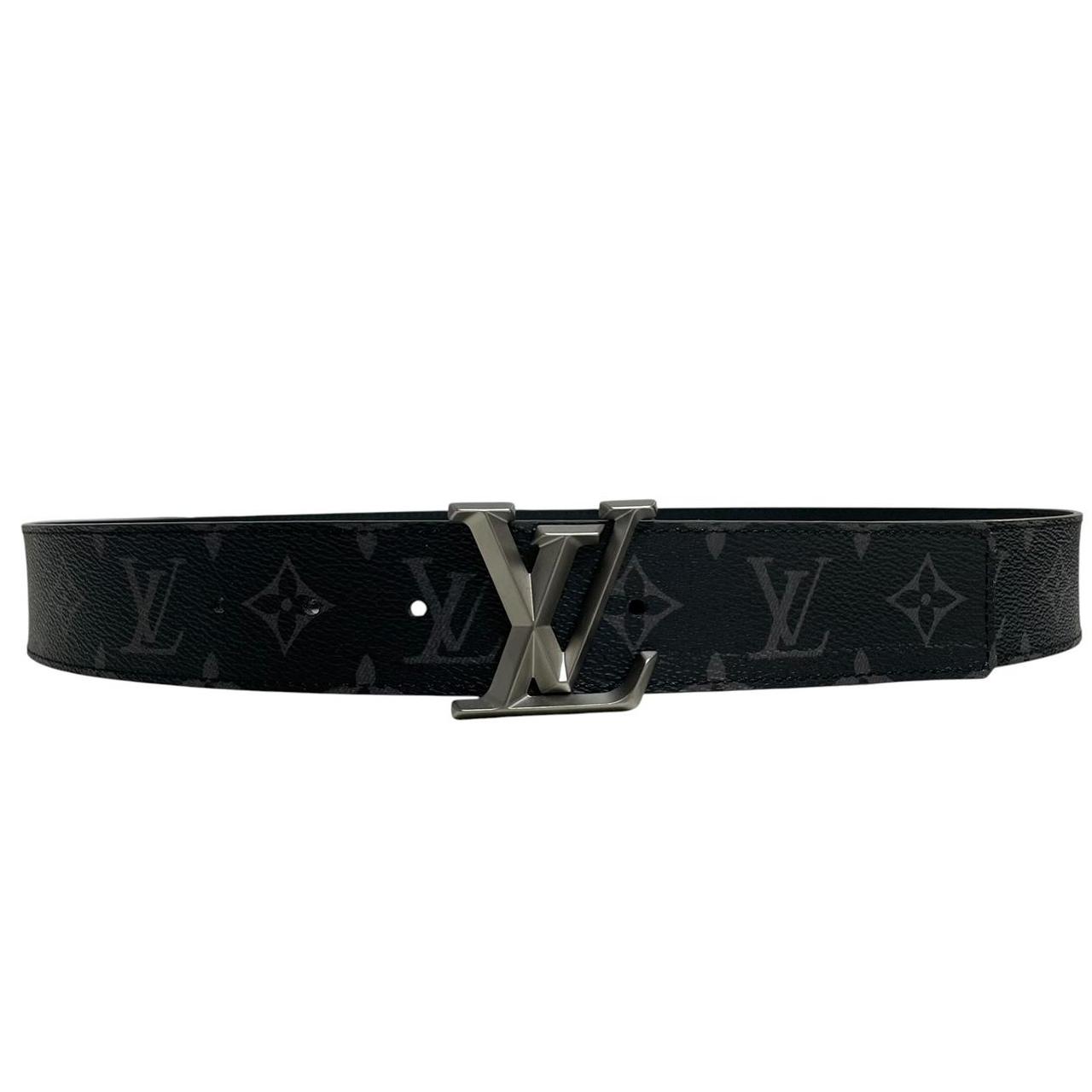 Louis Vuitton black canvas belt with LV monogram pattern and gold-tone buckle.