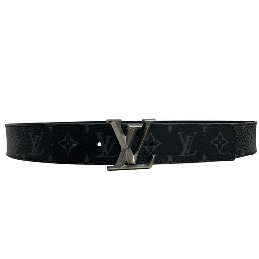 Louis Vuitton black canvas belt with LV monogram pattern and gold-tone buckle.