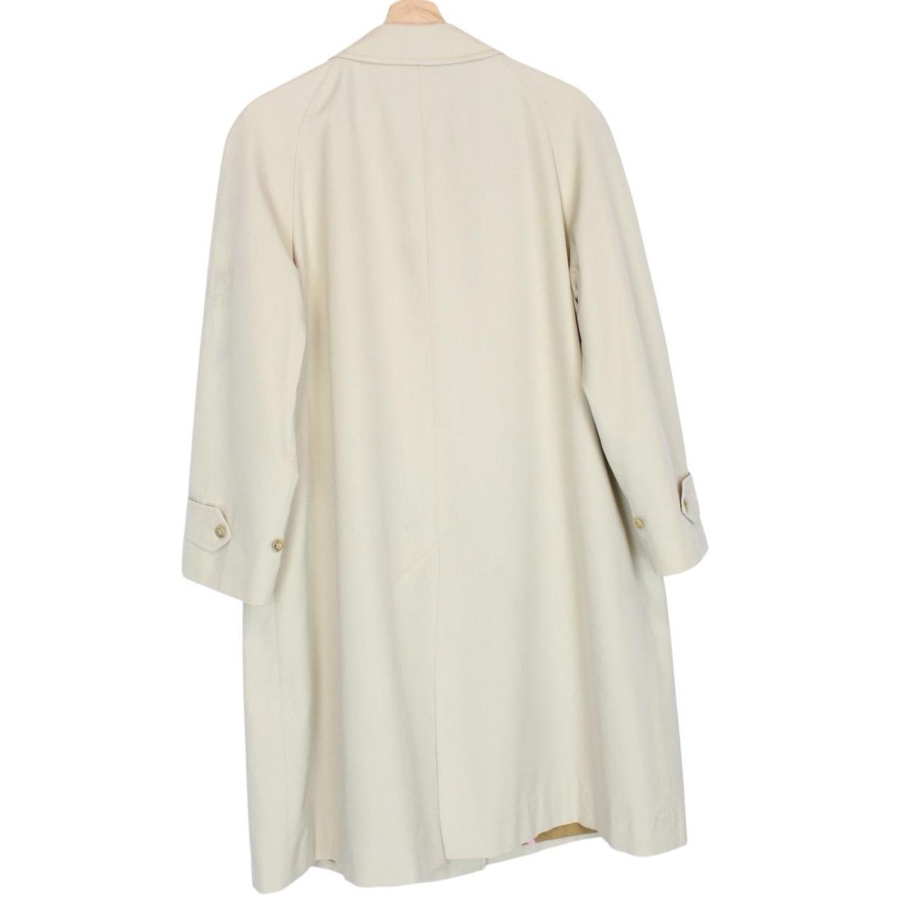 Burberry cream trench coat, single breasted, vintage 80s style, visible mark on sleeve.