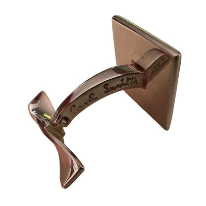 Paul Smith silver cufflinks with beveled edge and engraved "PS" logo.