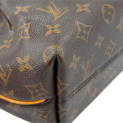 Louis Vuitton brown messenger bag with monogram canvas and leather trim details.