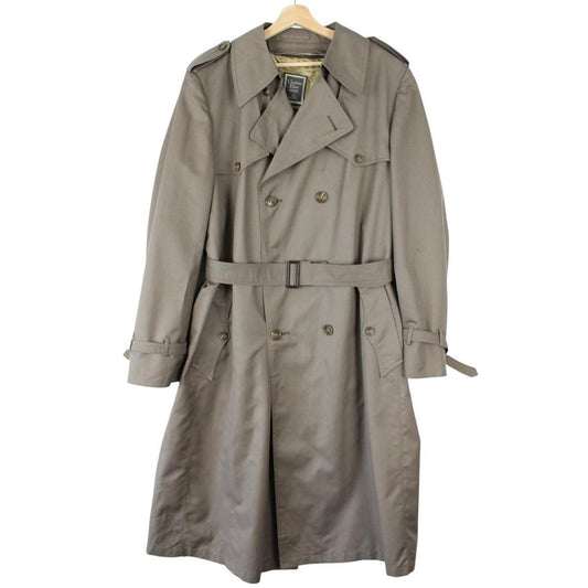 Christian Dior grey double breasted trench coat with removable wool lining and belted waist.