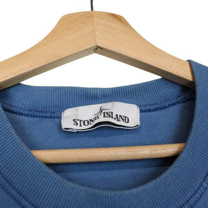 Stone Island blue cotton sweatshirt with embroidered logo and slight wear marks.