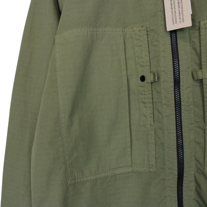 Stone Island green ripstop full zip overshirt jacket with logo patch and cotton material.