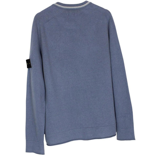 Stone Island blue wool knit jumper with logo patch and ribbed cuffs.