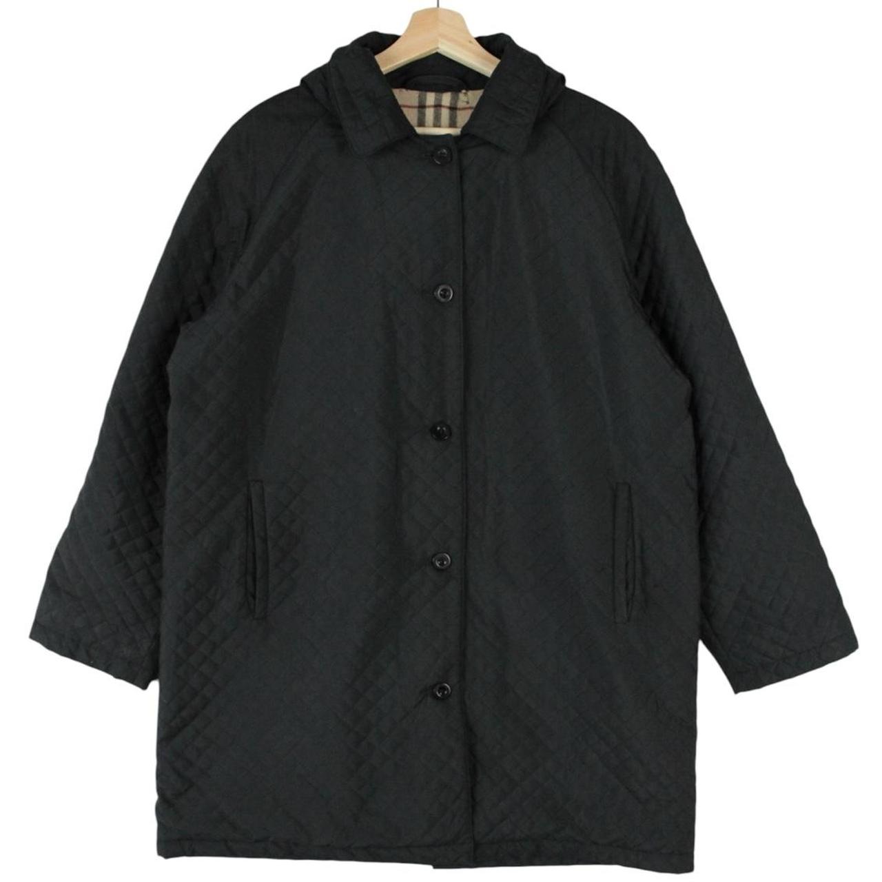 Burberry black quilted jacket with Nova Check lining and logo detail.