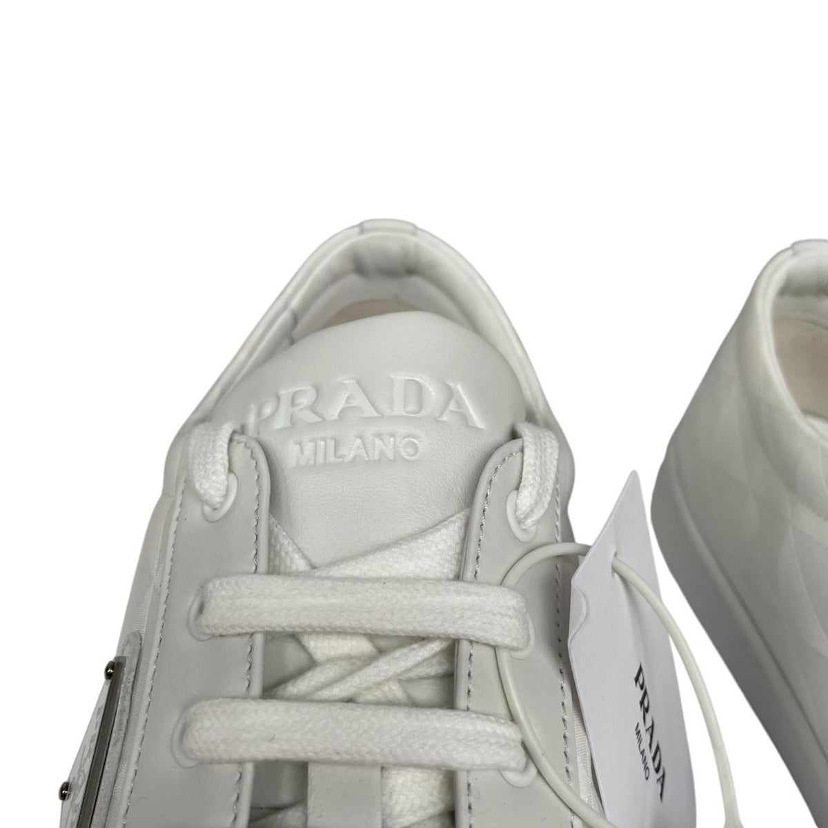 Prada white trainers Re-Nylon and brushed leather with logo detail and dust bags.