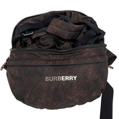 Burberry brown and black convertible bum bag with ape logo and durable material.