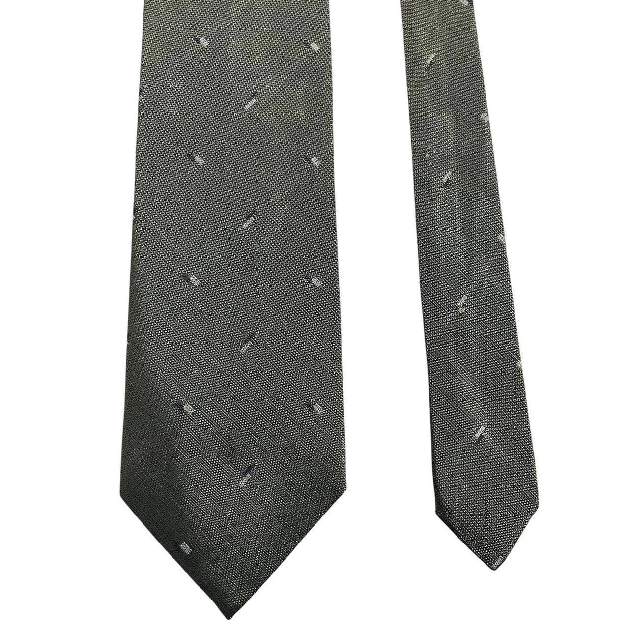 Armani vintage tie wool/polyester blend, dark pattern with subtle logo detail.