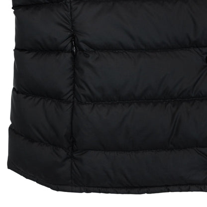 Moncler black quilted shell down gilet with logo patch and zip pockets.