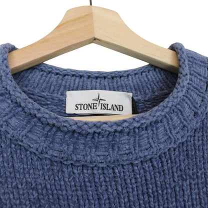 Stone Island blue jumper with degrade knit pattern and logo badge on sleeve.