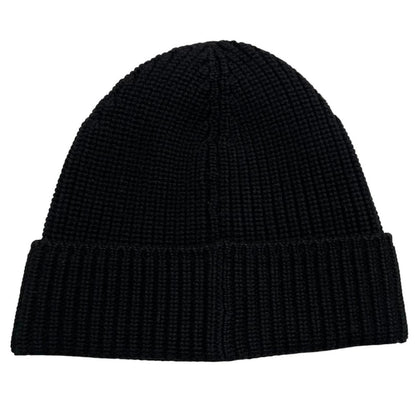 Canada Goose black ribbed wool beanie hat with logo patch on front.