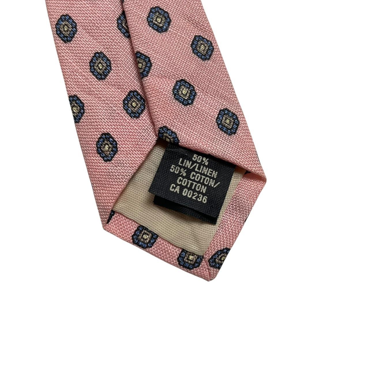 Lanvin pink silk tie with geometric print and logo detail.