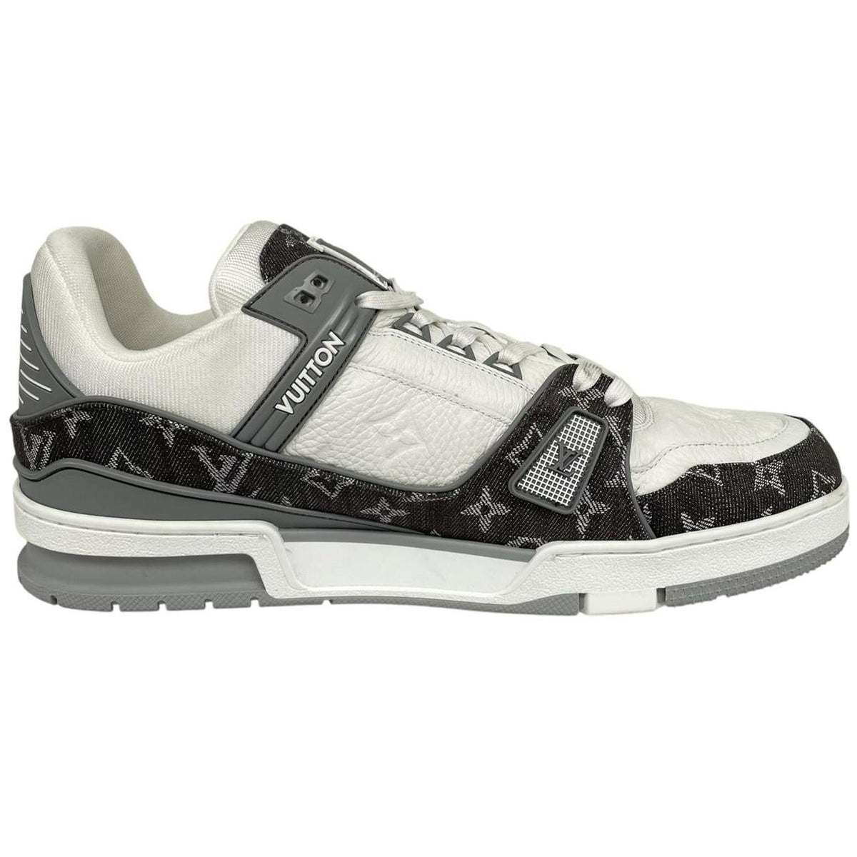 Louis Vuitton grey and white trainers with monogram pattern and leather accents.