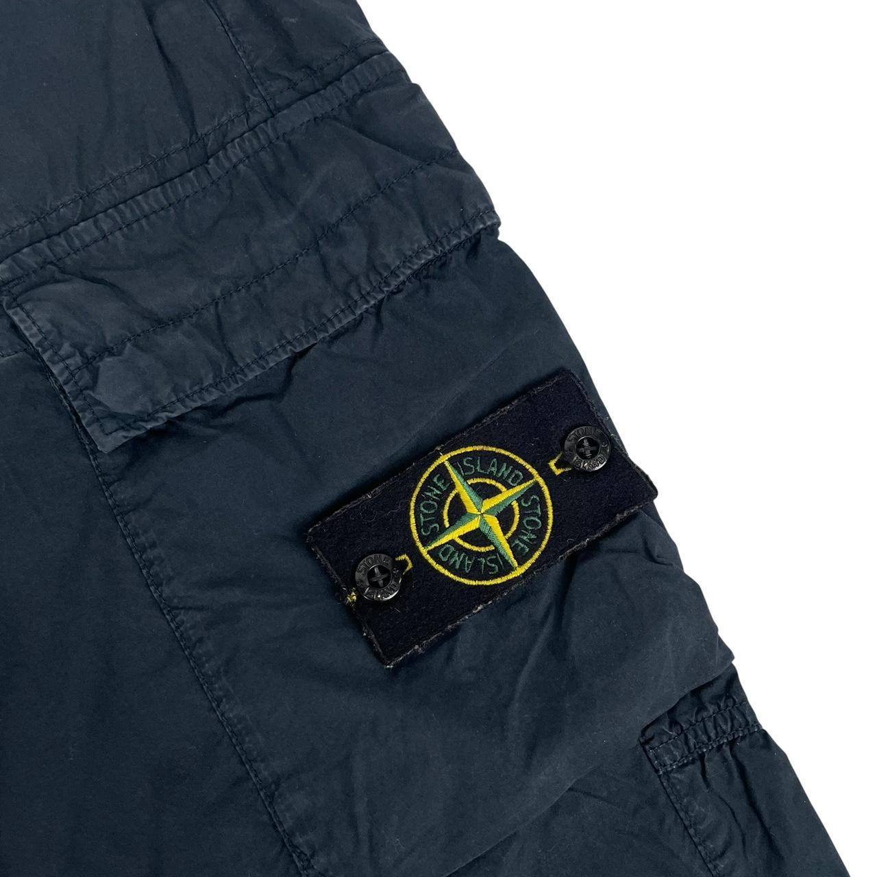 Stone Island navy blue cargo trousers with logo patch and multiple pockets.