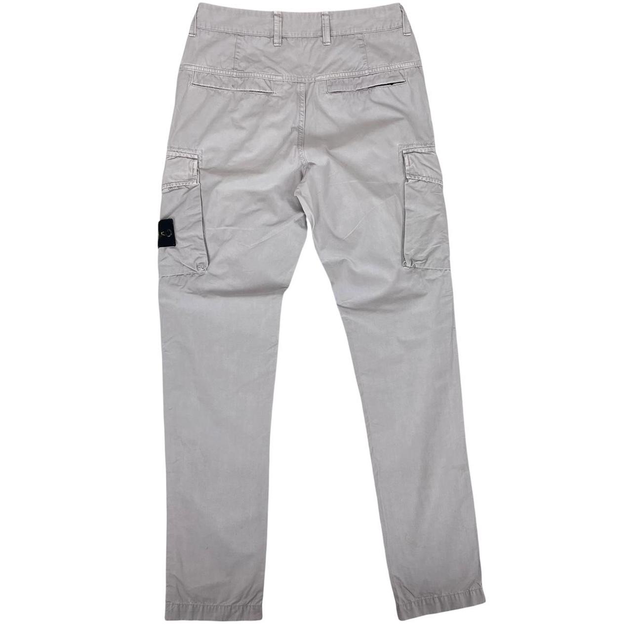 Stone Island grey cargo trousers with logo patch and slim fit design.