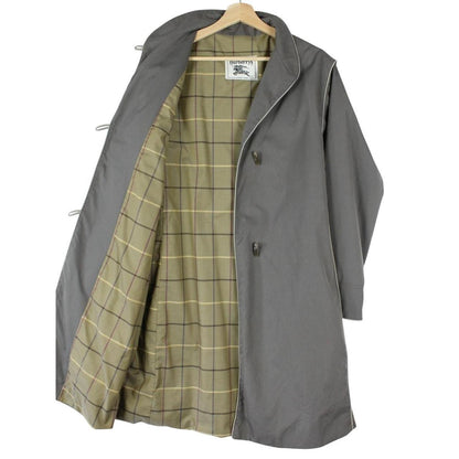 Burberry grey trench coat, single breasted, classic design, vintage 80s style.