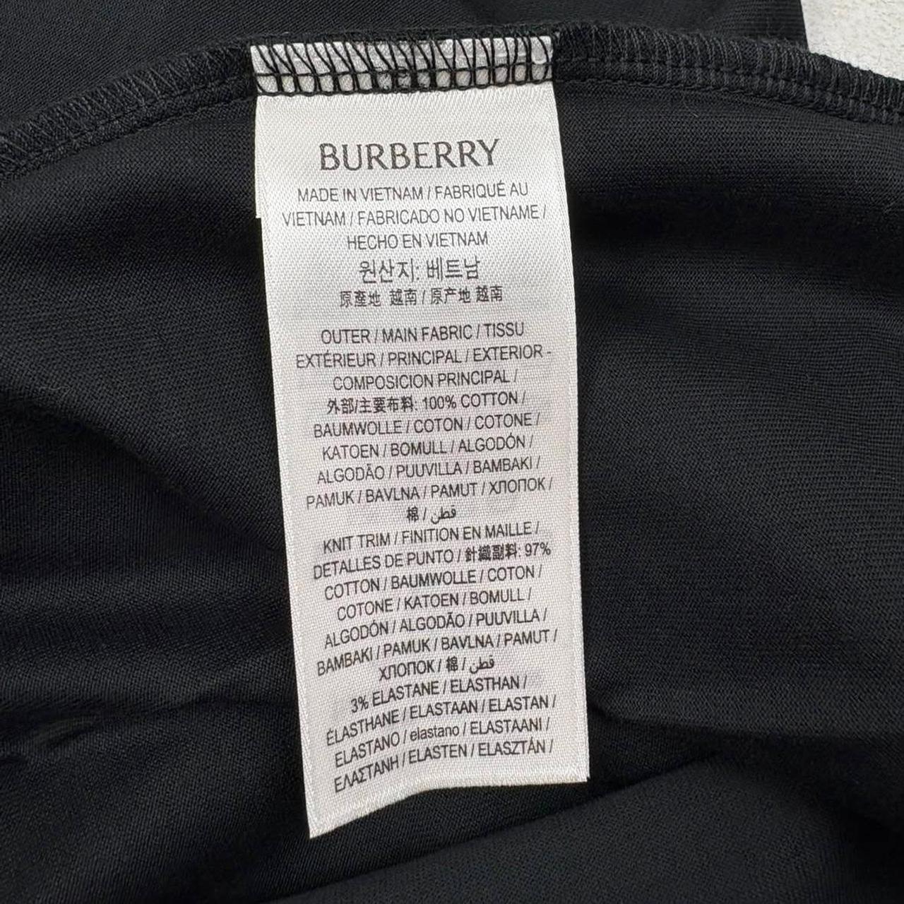 Burberry black cotton t-shirt with Nova Check pocket and logo detail.