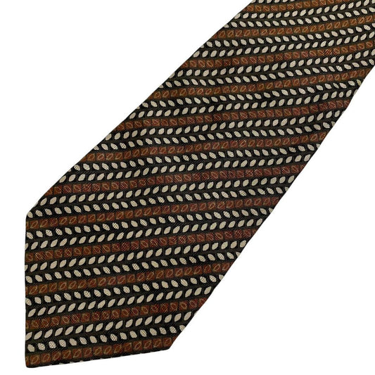 Coach brown floral print silk tie with intricate flower patterns and smooth texture.