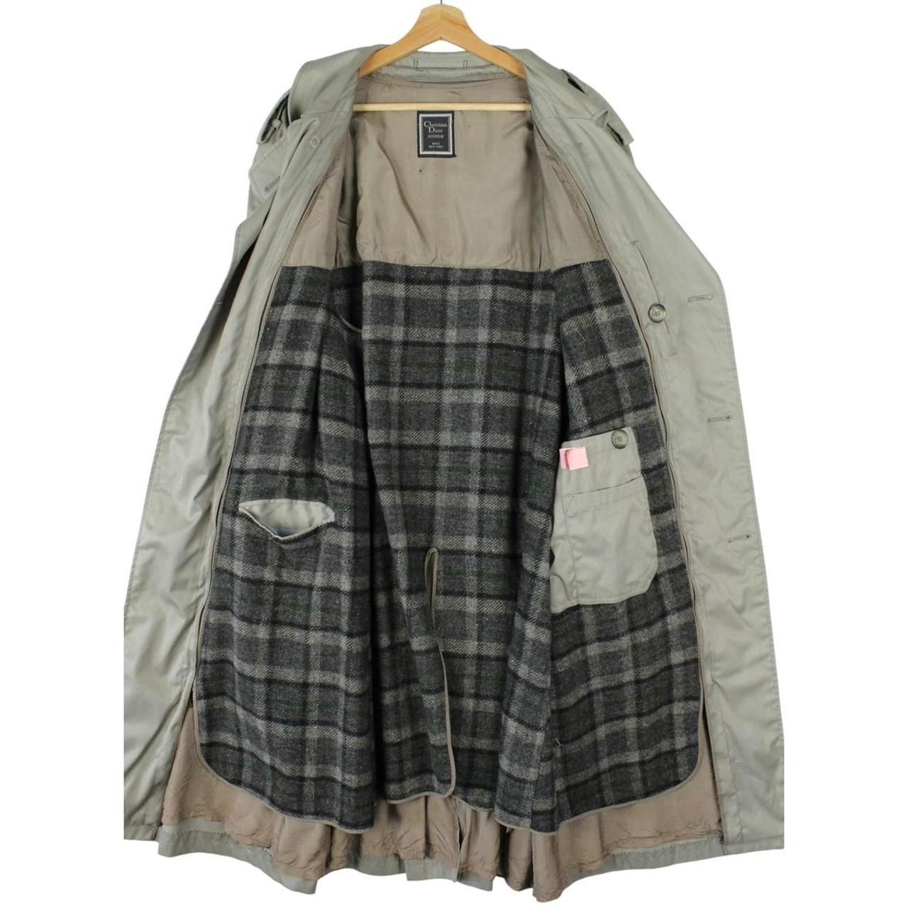 Christian Dior grey double-breasted trench coat with removable wool lining and belted waist.