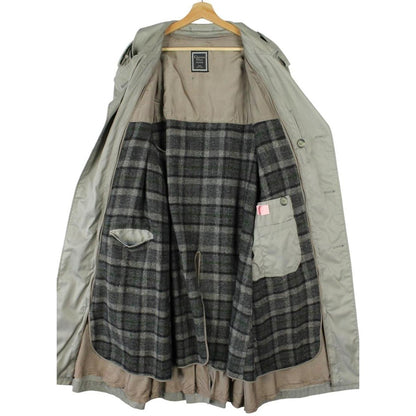 Christian Dior grey double-breasted trench coat with removable wool lining and belted waist.