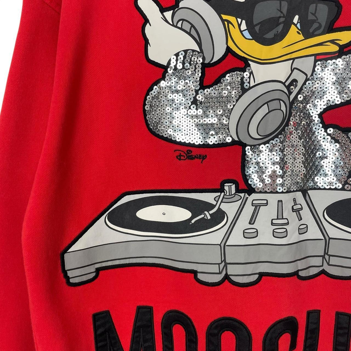 Moschino red cotton sweatshirt featuring Disney graphic print and logo details.