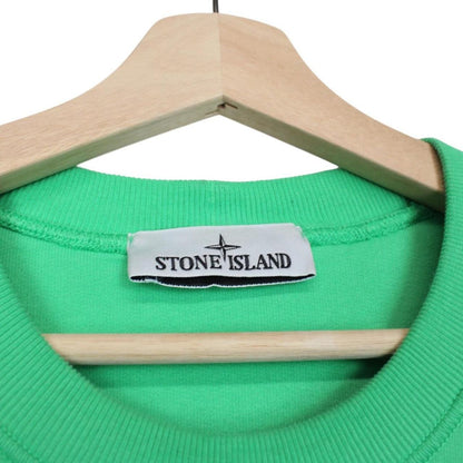 Stone Island green cotton sweatshirt with iconic compass logo and ribbed cuffs.